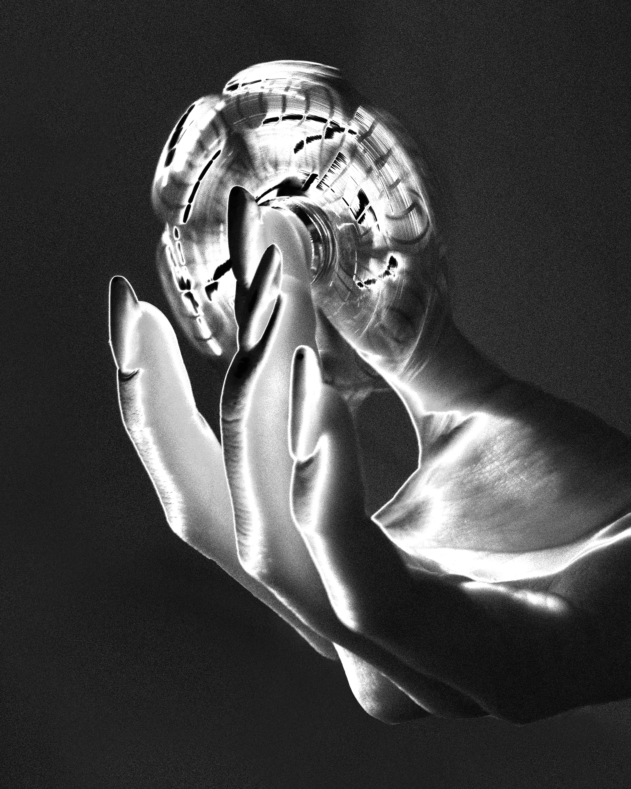 Hand holding a spinning light object from the Darkstar artwork