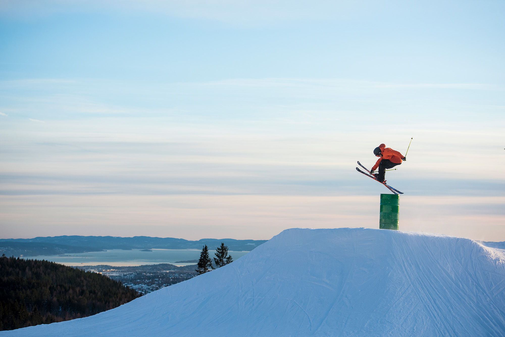 Photo of a twintip skier in a terrain park at a snowy ski resort